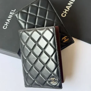 chanel black classic passport holder.webp