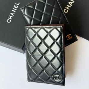chanel passport holder in black.webp
