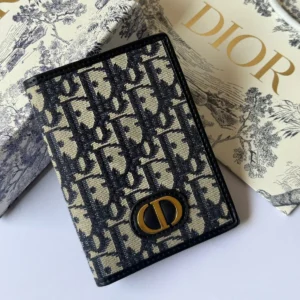 dior 30 montaigne passport holder in blue dior oblique jacquard.webp
