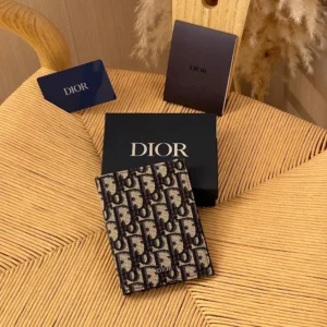 dior vertical bifold passport holder in beige and black scaled 1.webp