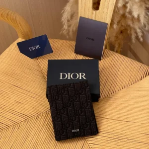 dior vertical bifold passport holder in black scaled 1.webp