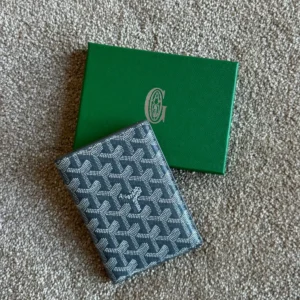 goyad passport holder gray.webp