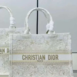 design medium book tote gold tone and white butterfly around the world.webp