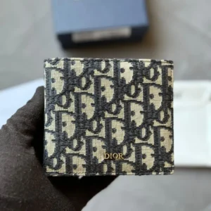 design oblique bill clip wallet beige black dubai fashion lux.webp