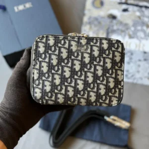 design pouch with strap shoulder bag beige black oblique jacquard dubai.webp