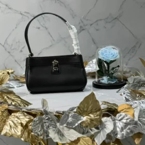 design women small key bag dusty ivory box calfskin dubai fashion lux.webp